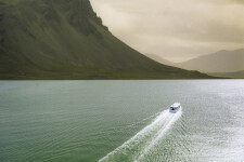 This dream-like photograph of a sunlit ferry crossing an expanse of sea was taken by Mark Bartkiw. Image 3