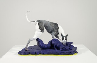 This tabletop indoor figurative sculpture of animals is made of resin.