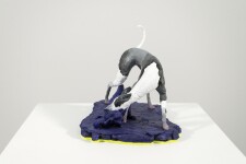 A cast resin figurine of a hound who has hunted a fox, which in turn has hunted a goose is patinated in indigo, black and white by emerging … Image 4