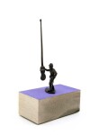 A military figure challenges an invisible foe with a latte stick in this playful bronze sculpture with wood base by P. Image 2