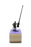 A military figure challenges an invisible foe with a latte stick in this playful bronze sculpture with wood base by P. Image 4