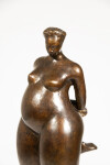 A voluptuous female figure is rendered in this compelling modern tabletop bronze sculpture by Paul Duval. Image 8