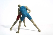 Two figures wrestle in this playful paper mache sculpture by Paul Duval. Image 3