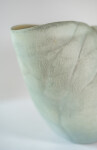 This contemporary ceramic vessel is moss green in color. Image 9