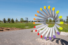 This modern contemporary outdoor sculpture is forged from steel in an abstract form. Image 4