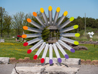 This modern contemporary outdoor sculpture is forged from steel in an abstract form. Image 2