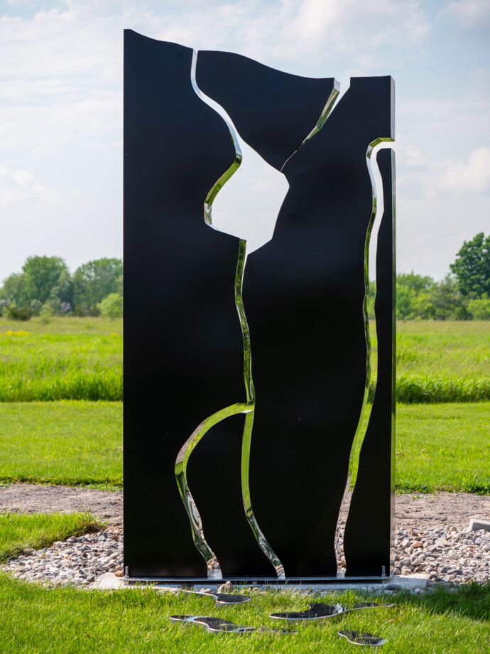 This modern black-painted steel outdoor sculpture is by Philippe Pallafray.