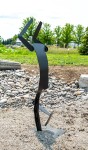 Like an athlete poised to perform the broad jump, this metal sculpture by Canadian artist Robert Clarke Ellis has a palpable energy. Image 4