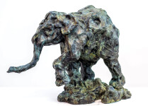 This delightful bronze statuette of a walking baby elephant is highly textured and finished with an elegant sepia patina. Image 3