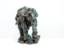 This delightful bronze statuette of a walking baby elephant is highly textured and finished with an elegant sepia patina. Image 2