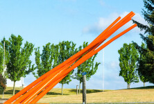 This contemporary orange-colored metal outdoor sculpture is the work of Shayne Dark. Image 8