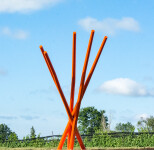 This contemporary orange-colored metal outdoor sculpture is the work of Shayne Dark. Image 3