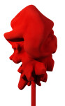 In bright red, the organic shape of this sculpture by Shayne Dark makes a bold statement. Image 3