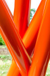 This contemporary orange-colored metal outdoor sculpture is the work of Shayne Dark. Image 9