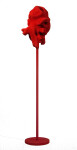 In bright red, the organic shape of this sculpture by Shayne Dark makes a bold statement. Image 4