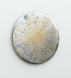 This contemporary metal wall sculpture inspired by nature was made by Shayne Dark.