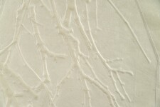 This contemporary embossed print in white is inspired by nature. Image 5