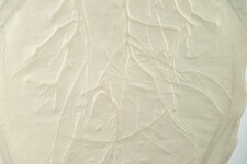 This contemporary embossed print in white is inspired by nature. Image 7