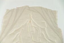 This contemporary embossed print in white is inspired by nature. Image 8