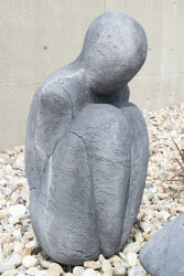 This concrete outdoor sculpture in minimalist form was made by Susan Low-Beer.