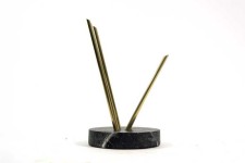 Solid steel rods coated in brilliant brass rise out of a soapstone base and reach upward in this stunning table-top sculpture by Canadian ar… Image 2