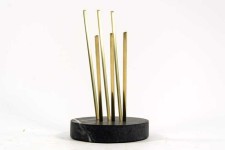 Solid steel rods coated in brilliant brass rise out of a soapstone base and reach upward in this stunning table-top sculpture by Canadian ar… Image 3