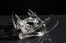 The distinctive and elegant shape of deer antlers emerges from hand-blown translucent glass to create this contemporary tabletop sculpture b… Image 3