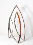 This elegant and dynamic contemporary stainless steel sculpture was created by Ulysses Veloso to emulate the warmth and shape of a bonfire. Image 3